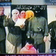 Hassim (second from left) works a night shift for the Brotherhood Of Total Islamic War.